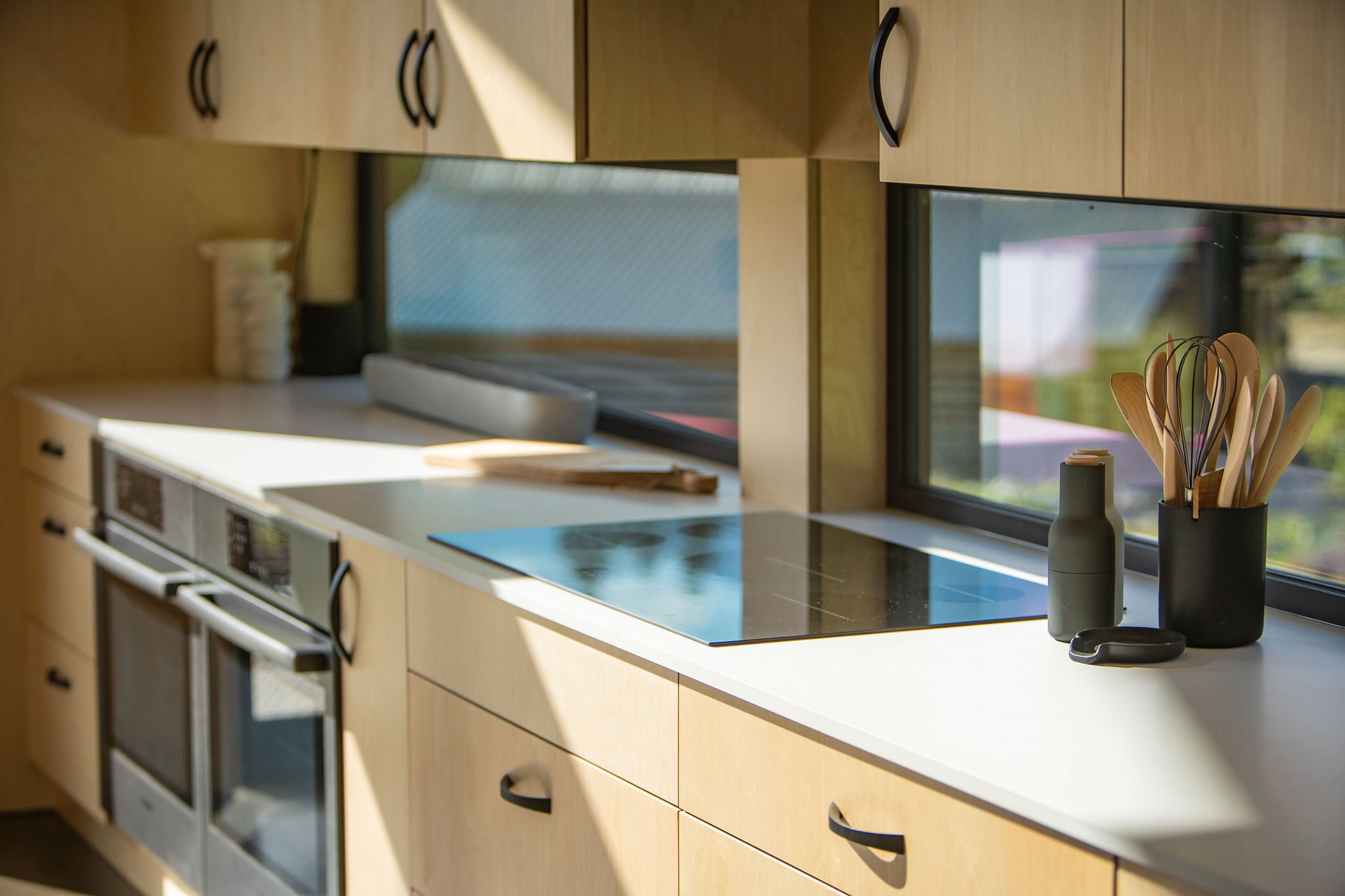 induction cooker and cooking utensils in the kitchen