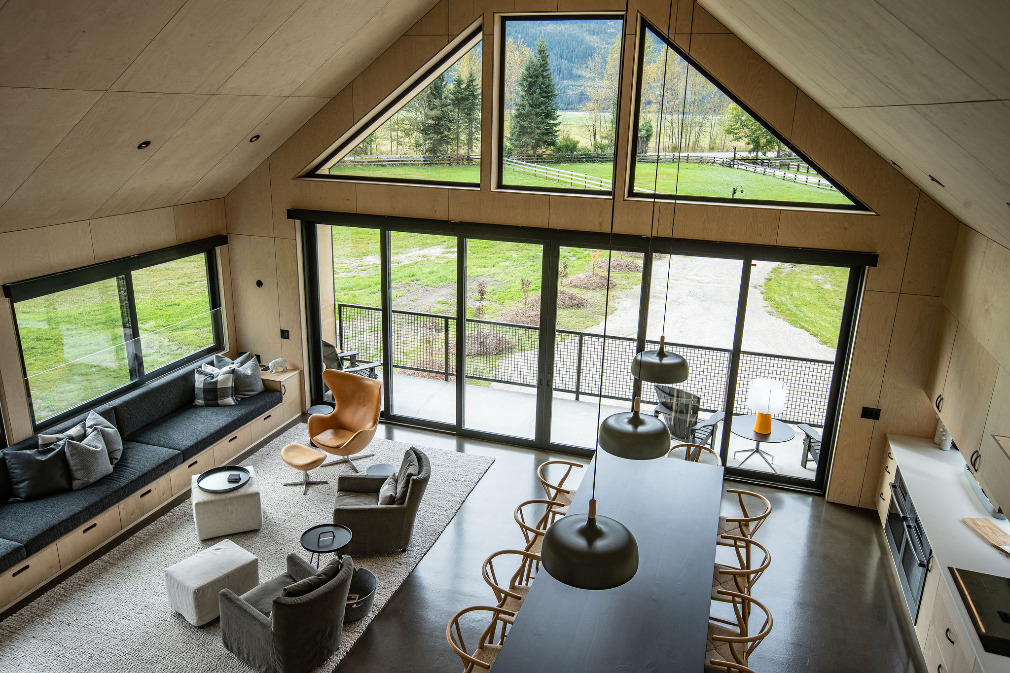 view of the dining, kitchen, and living area of a Scandinavian house