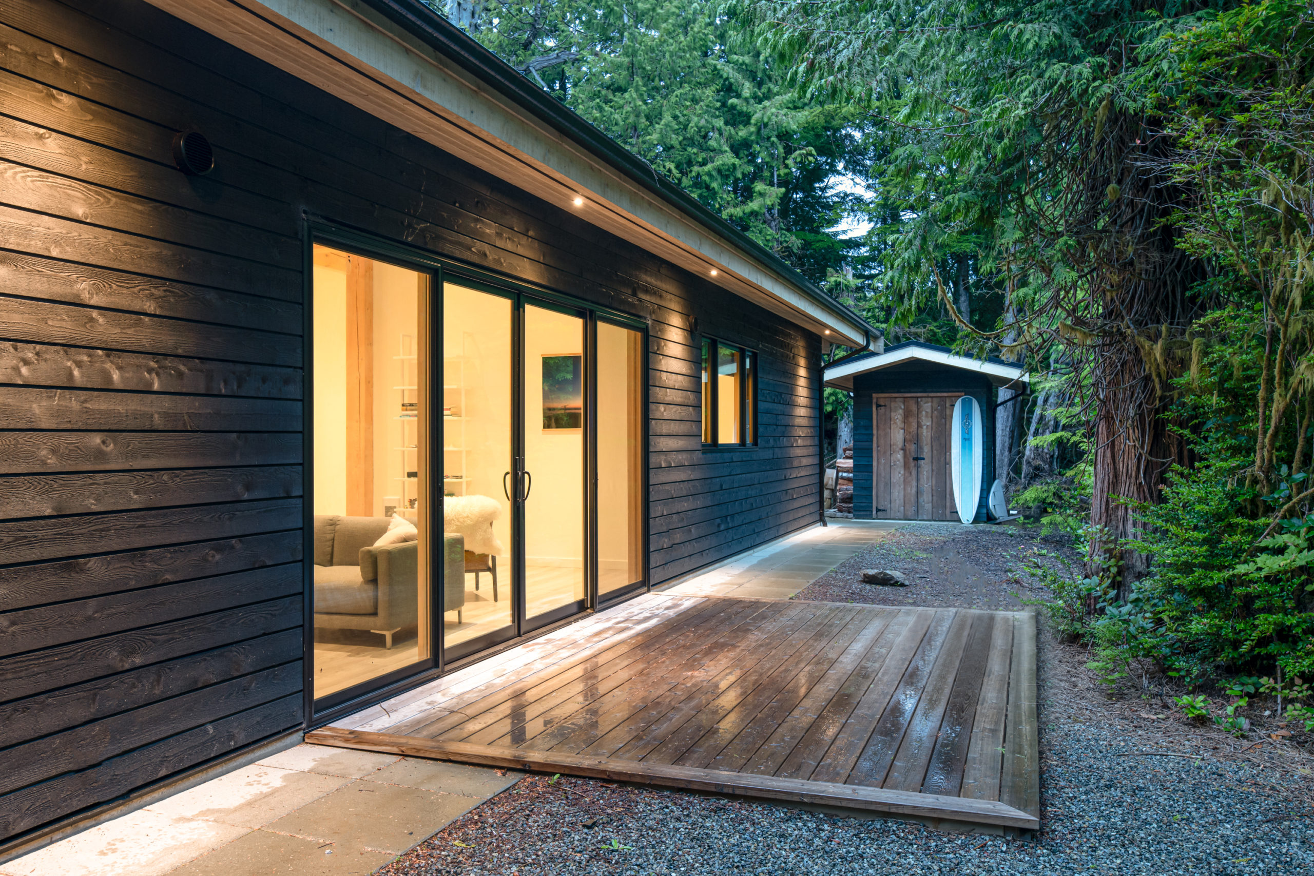 back area of a simple wooden single floor house