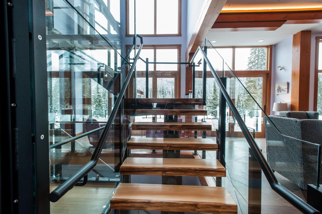 timber stairs with glass panels