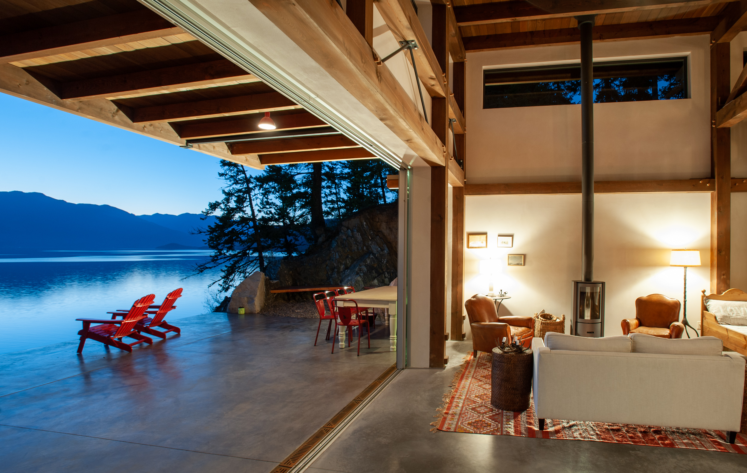 living area connected to the deck of a beach house