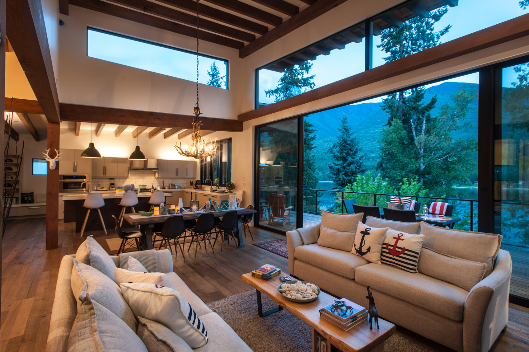 living area adjacent to dining and kitchen of a beach house