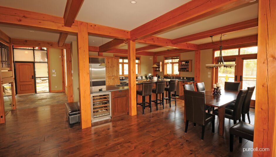 kitchen and dining area full of timber columns and accents