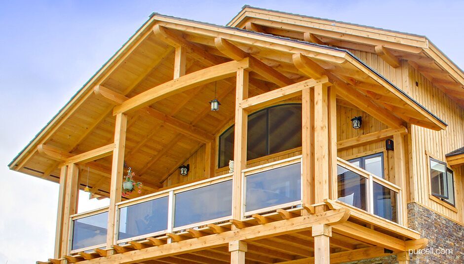 small balcony of a house made mostly of timber materials