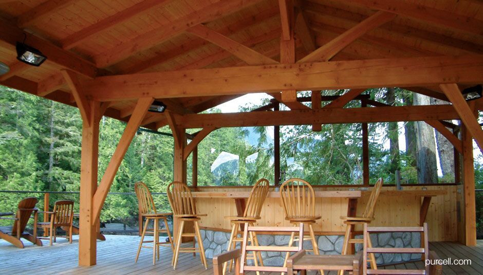 deck area with timber roofing and columns