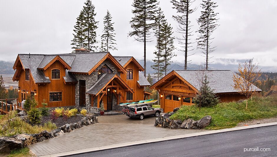 distant view of a contemporary timber-enhanced house with stone accents